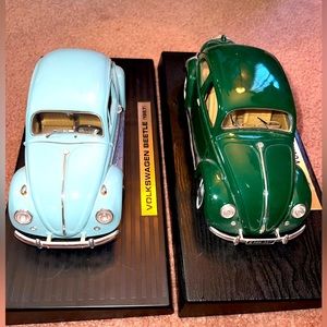 Two Volkswagen diecast model beetles